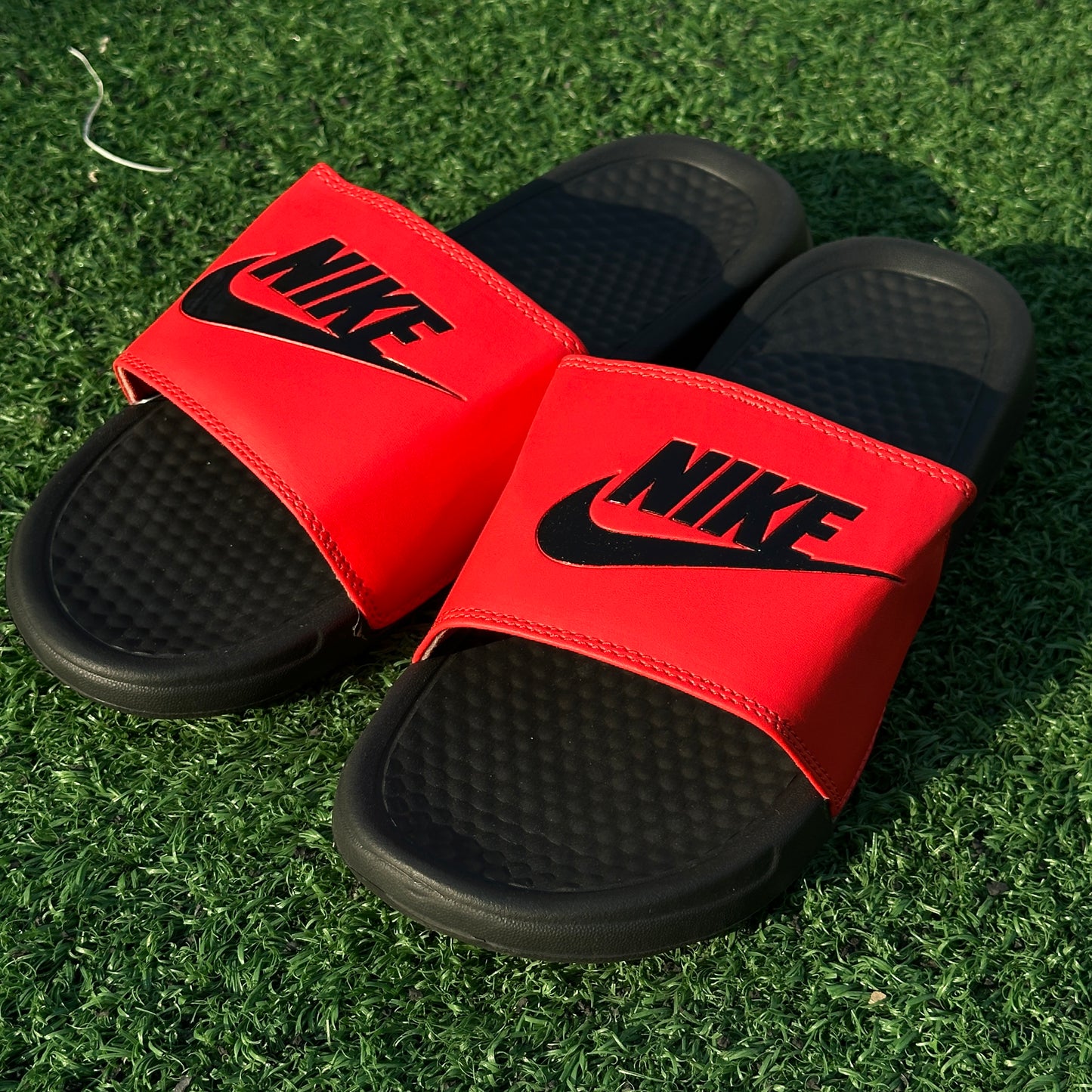 Chancletas Nike rojas