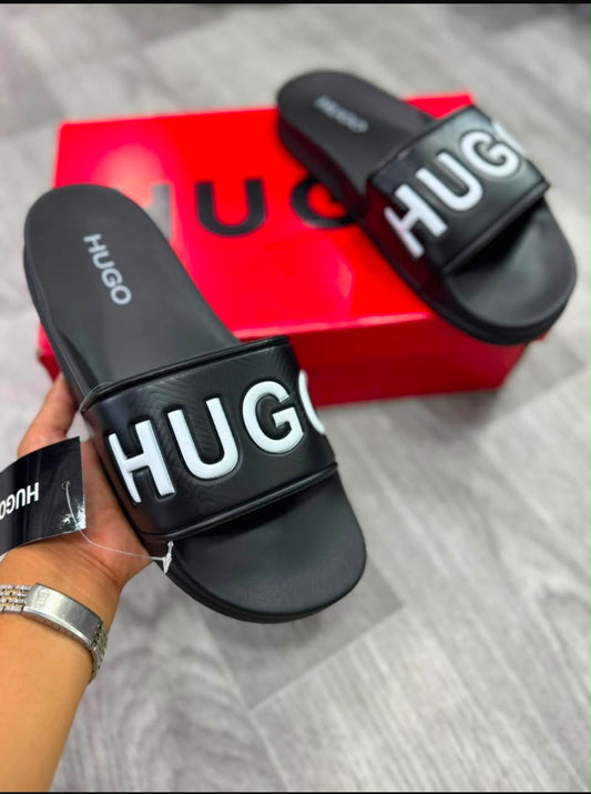 Chancletas Hugo negras con blanco
