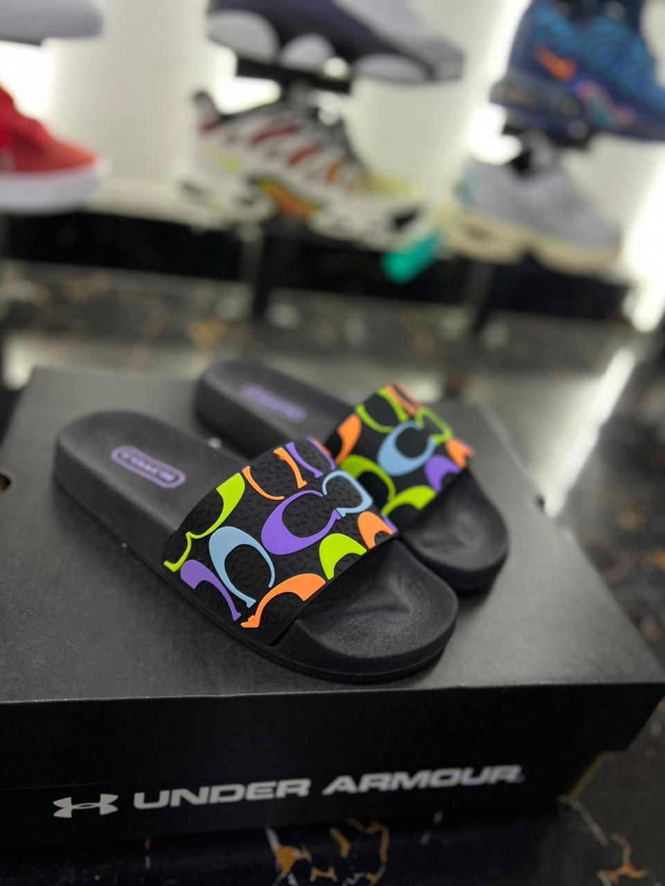 Chancletas coach negras