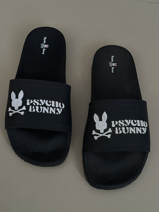 Chancletas psycho bunny negra