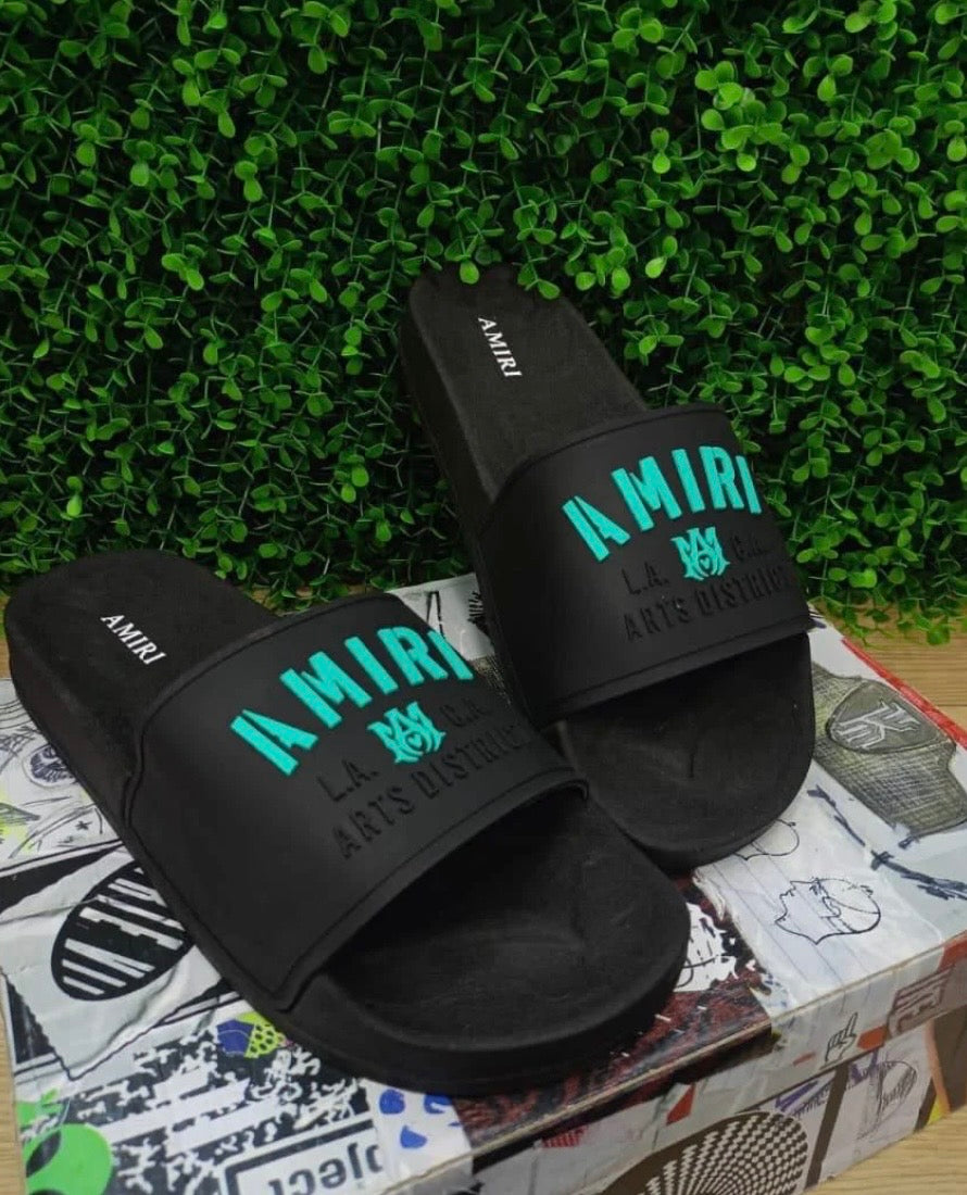 Chancletas Amiri negras con verde