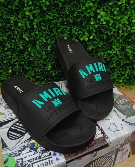 Chancletas Amiri negras con verde