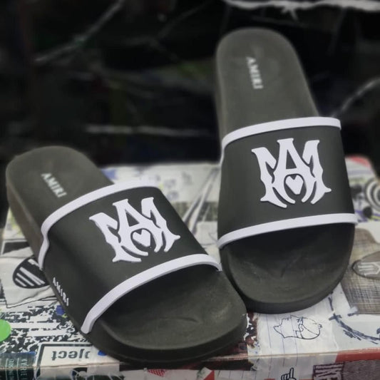 Chancletas Amiri Negras con Blanco