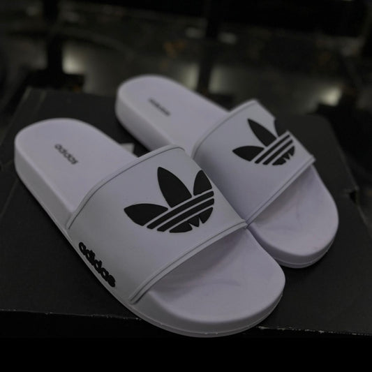 Chancletas Adidas blancas