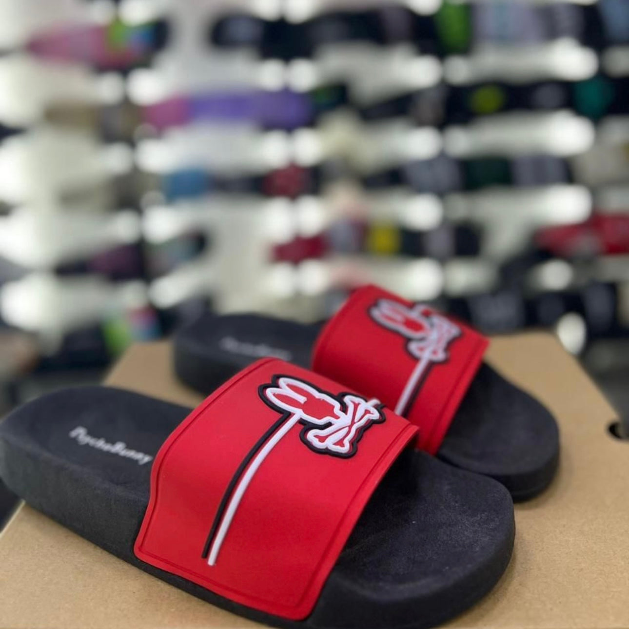 Chancletas psycho bunny Rojas