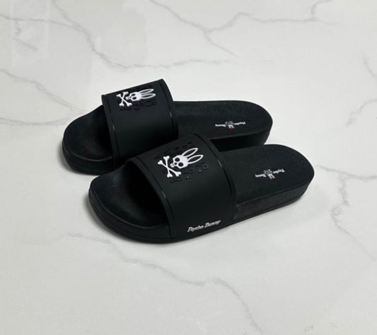 Chancletas negra psycho bunny