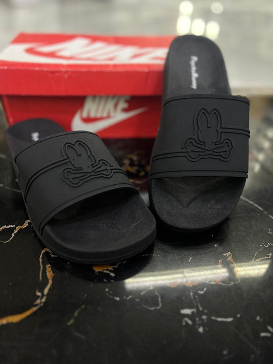 Chancletas psycho bunny negras