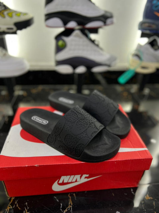 Chancletas coach negras